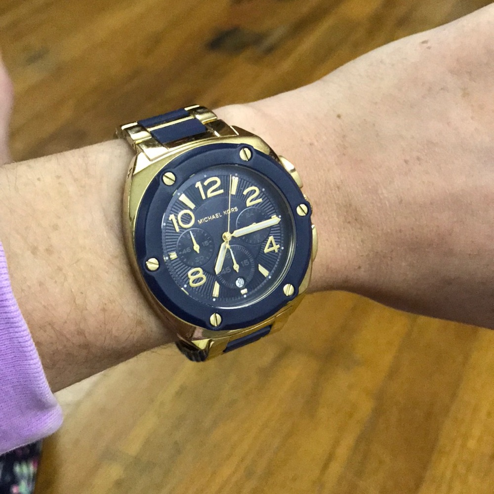 Navy and gold Michael Kors women’s watch.